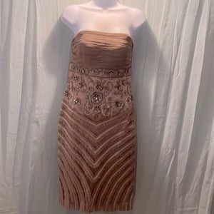 New with tags! Exquisitely beaded. No longer fits.